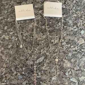 Two lariat necklaces by Erika